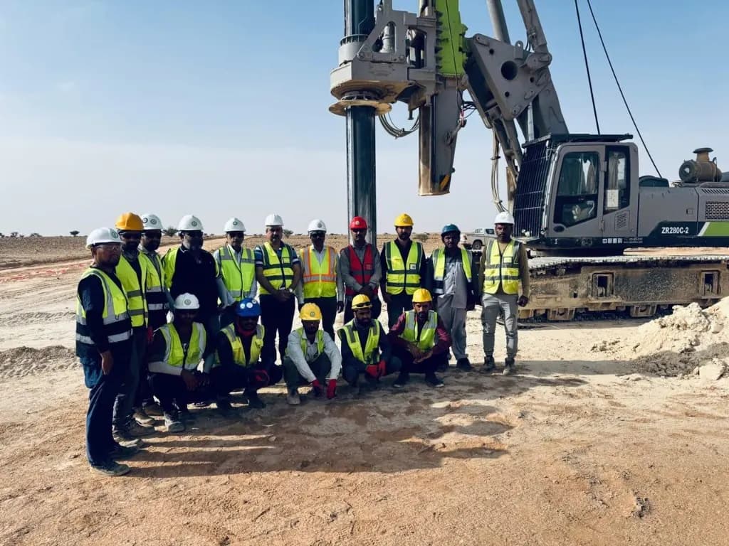 TIMC project crew with foundation drilling equipment on site